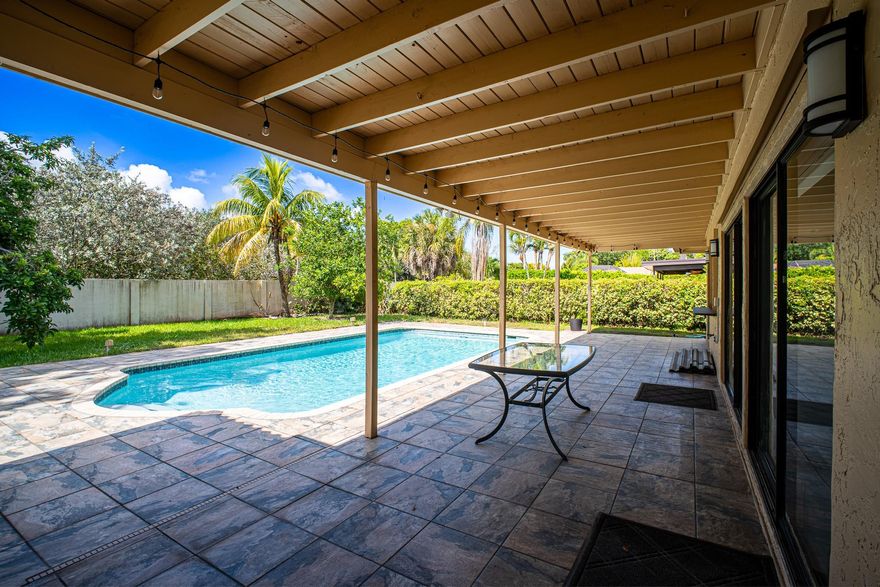 BEAUTIFUL 4 BEDROOM, 2 BATHROOM HOME IN THE HEART OF CORAL SPRINGS. FULLY UPDATED WITH TOP-OF-THE-LINE FINISHES, THIS PROPERTY OFFERS A MODERN AND LUXURIOUS LOOK. FEATURES INCLUDE A SOLAR PANEL WATER HEATER, NEWER A/C, NEW POOL PUMP, AND IMPACT WINDOWS ON THE FRONT WITH SHUTTERS ON THE BACK FOR COMPLETE STORM PROTECTION. ENJOY THE SPACIOUS OPEN-CONCEPT DESIGN WITH NEW LAMINATE FLOORING IN THE HALLWAY AND BEDROOMS. RELAX IN YOUR SALTWATER POOL AND TAKE ADVANTAGE OF THE ADVANCED WATER FILTRATION SYSTEM WITH SEDIMENT FILTERS AND REVERSE OSMOSIS. THE HOME IS ALSO EQUIPPED WITH ELECTRICAL SETUP FOR A GENERATOR. A TRULY BEAUTIFUL OPEN-CONCEPT HOME WITH WELCOMING ENERGY!!!