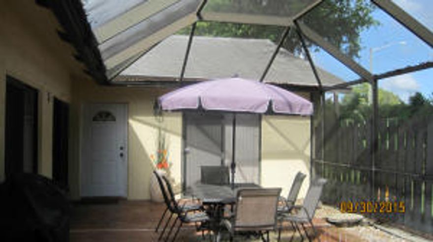 SPACIOUS AND GRACIOUS LIVING!  BEAUTIFULLY REMODELED VILLA WITH HUGE SCREENED AND FENCED FRONT PATIO, VAULTED CEILINGS, SPLIT BEDROOM/OPEN FLOOR PLAN, GRANITE COUNTERTOPS WITH TUMBLE MARBLE BACK SPLASH, DOUBLE SINK, UNDER CABINET LIGHTS, UPDATED APPLIANCES,LIGHT FIXTURES AND CEILING FANS, HIS AND HERS BUILT IN CLOSETS IN LARGE MASTER BEDROOM,LAMINATE FLOORING, TILED SHOWERS. QUIET NEIGHBORHOOD, 24/7 SECURITY, ASSIGNED PARKING WITH AMPLE GUEST SPOTS. GREAT LOCATION, PRIVATE AND SECLUDED. ROOF REPLACED IN 2005, A/C AND WATER HEATER​​‌​​​​‌​‌​​​‌‌​​​‌‌‌​​‌​​‌‌​​​​ 2007.