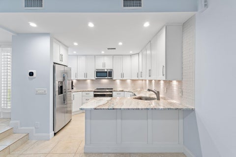 Photo of 2605 Fairway Drive N, Jupiter, FL 33477 (MLS # B26036782)