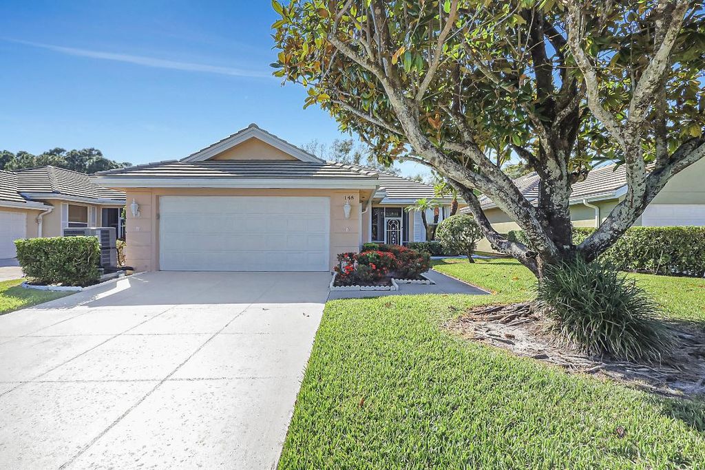 Photo of 148 NW Bentley Circle, Port Saint Lucie, FL 34986 (MLS # R10960944)