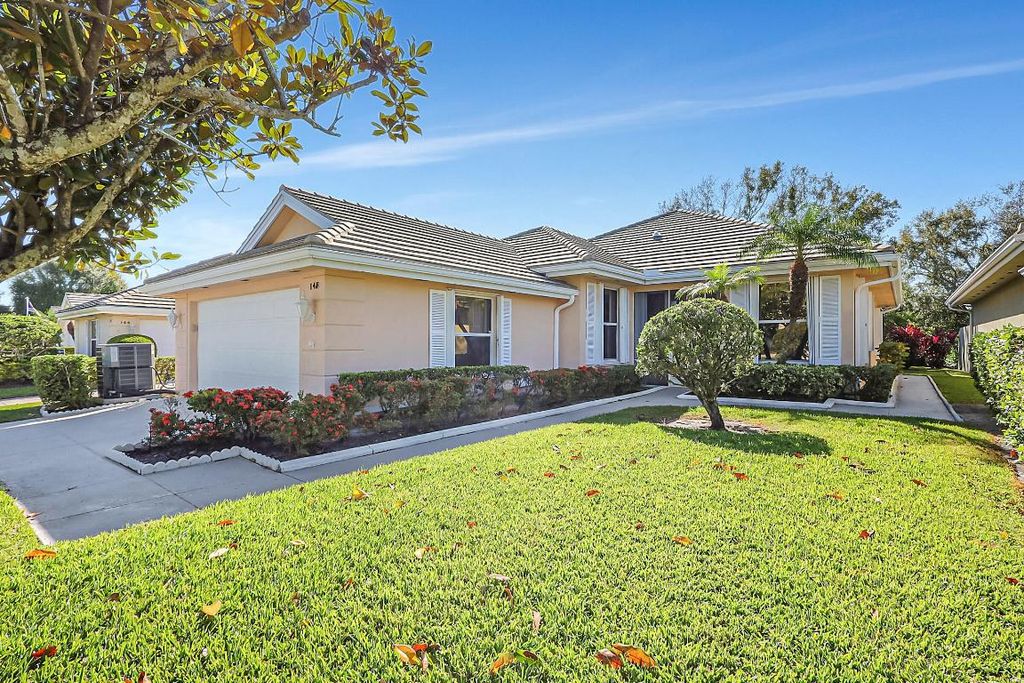 Photo of 148 NW Bentley Circle, Port Saint Lucie, FL 34986 (MLS # R10960944)