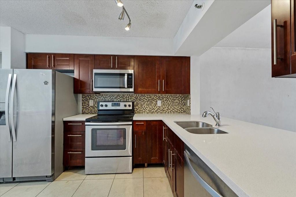 Photo of 2200 S Cypress Bend Drive #306, Pompano Beach, FL 33069 (MLS # F10492604)