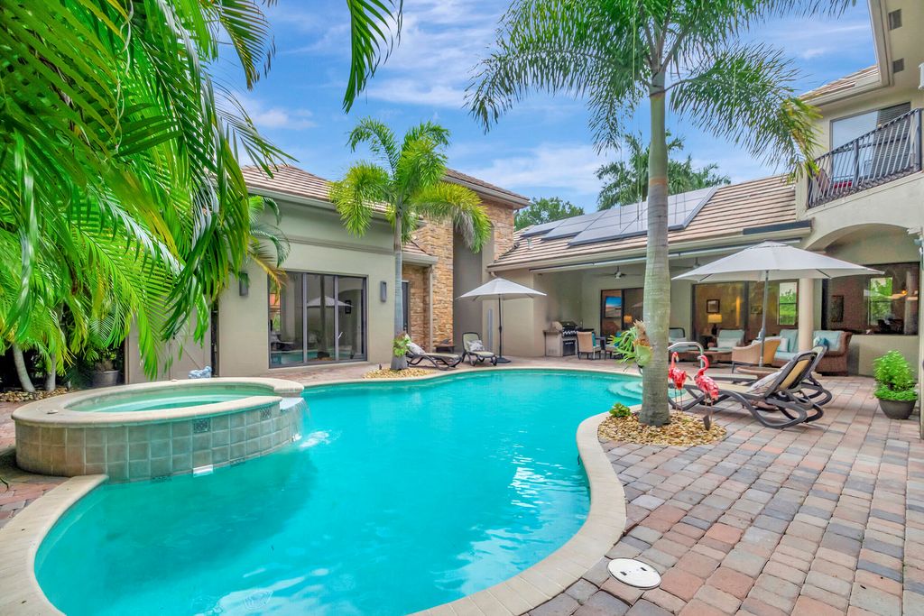 Photo of 10699 Versailles Boulevard, Wellington, FL 33449 (MLS # R10928071)