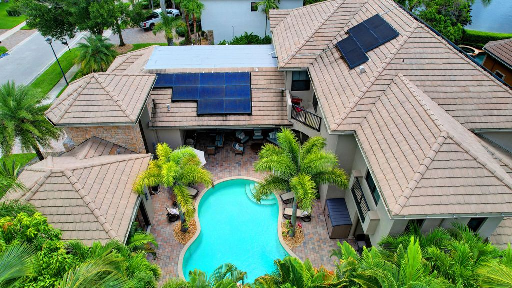 Photo of 10699 Versailles Boulevard, Wellington, FL 33449 (MLS # R10928071)