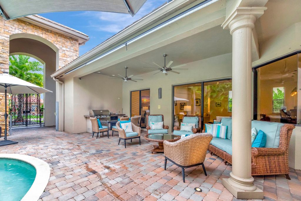 Photo of 10699 Versailles Boulevard, Wellington, FL 33449 (MLS # R10928071)