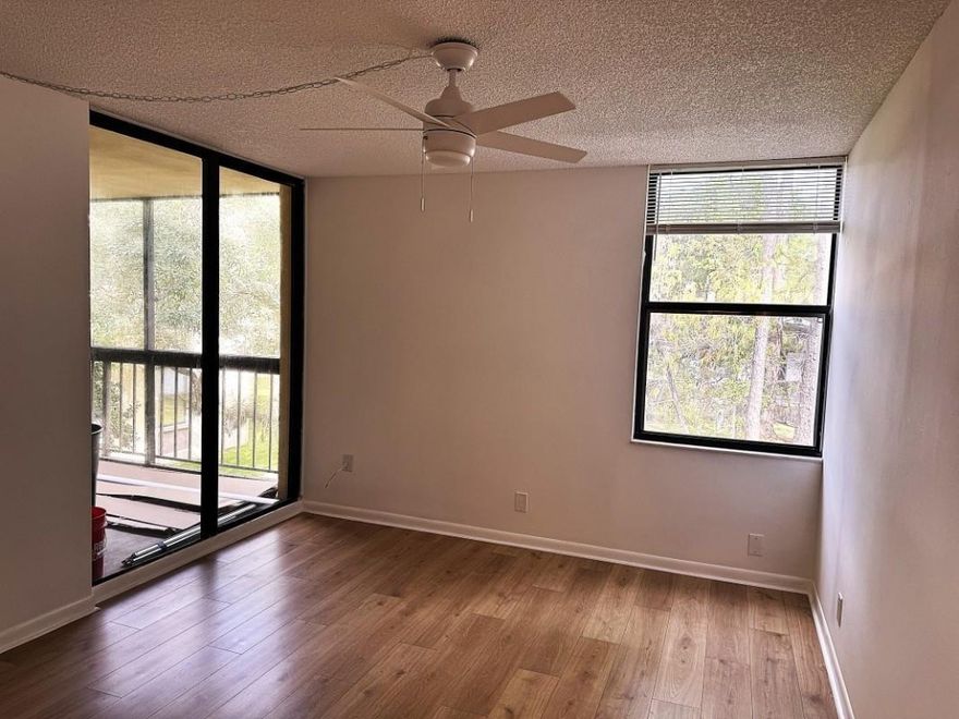 Spacious split-plan 2 bd and 2 ba renovated unit has new laminate flooring, all NEW appliances which include washer/dryer, freshly painted, new fixtures, etc. Bedrooms are spacious with plenty of closet space. The spacious screened patio overlooks a lush wooded area. Close to schools, shopping, restaurants, parks, etc. This developments has a pool, club house, elevator, assigned parking and plenty of guest parking.