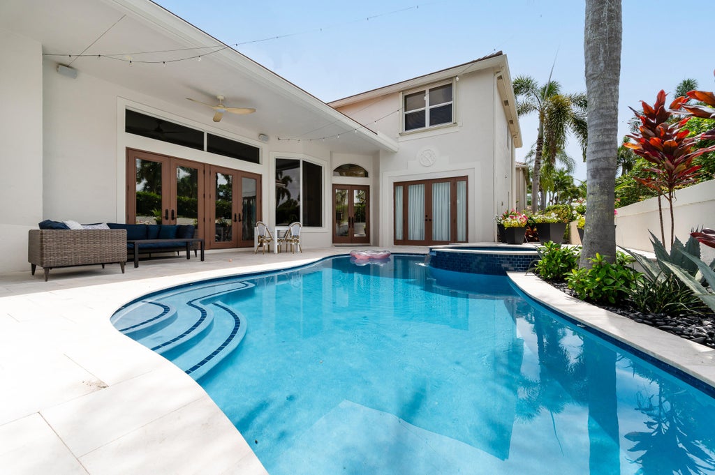 Photo of 3323 NW 53RD Circle, Boca Raton, FL 33496 (MLS # B26051872)