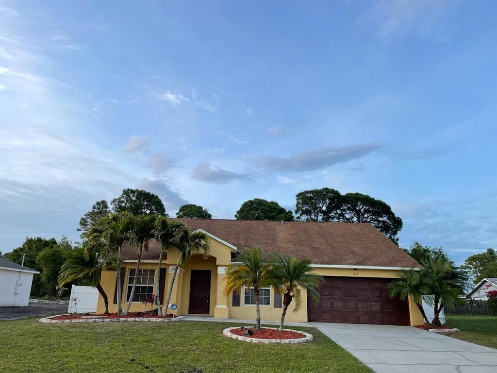 Photo of 1137 SW Coleman Avenue, Port Saint Lucie, FL 34953 (MLS # R10786142)