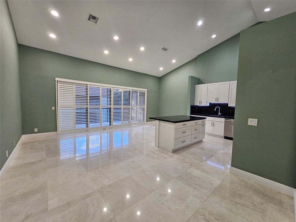 Photo of 5770 Coach House Circle #F, Boca Raton, FL 33486 (MLS # B26044225)