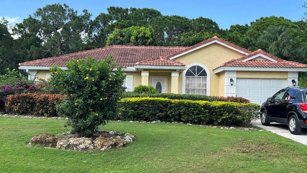 Photo of 5462 NW Clark Avenue, Port St Lucie, FL 34983 (MLS # R10914134)