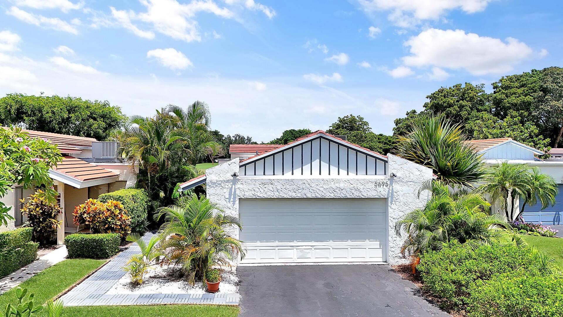 Welcome to your personal haven in a serene Florida location! Nestled in a peaceful cul-de-sac, this vibrant and modern home offers 3 bright bedrooms and 2 stylish bathrooms, ensuring the ultimate in comfortable living. As you step inside, you'll be greeted by smooth walls and a vaulted ceiling that amplify the airy feel. Natural light floods through impact windows, highlighting the neutral flooring. The home stays perfectly comfortable with a newer 4-ton Rheem AC and features an enclosed sunroom with its own A/C, perfect for relaxation. The kitchen is a chef's delight, showcasing quartz countertops, a chic tile backsplash, and wood cabinets with pots and pan drawers. It features a new refrigerator and an induction cooktop, making it a modern culinary space