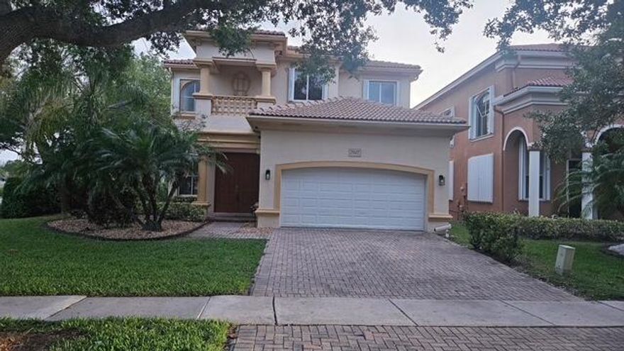 Discover this elegant former model home in the sought-after, gated Terracina community. Situated on a premium corner lot, it offers serene lake views and over 3,000 square feet of living space. This 4-bedroom, 3-bath residence features a spacious open kitchen that flows seamlessly into the main living areas, perfect for entertaining. Enjoy tranquil water views from the patio, impact doors, primary suite, and flexible office or fourth bedroom. Natural light fills the home, highlighting its clean, elegant design and thoughtful layout. Relax and unwind with peaceful mornings and scenic evenings in this exceptional home that perfectly blends comfort, style, and location. The entire home has a water purification system, newer AC, duct purification, reverse osmosis, and double door entrance.