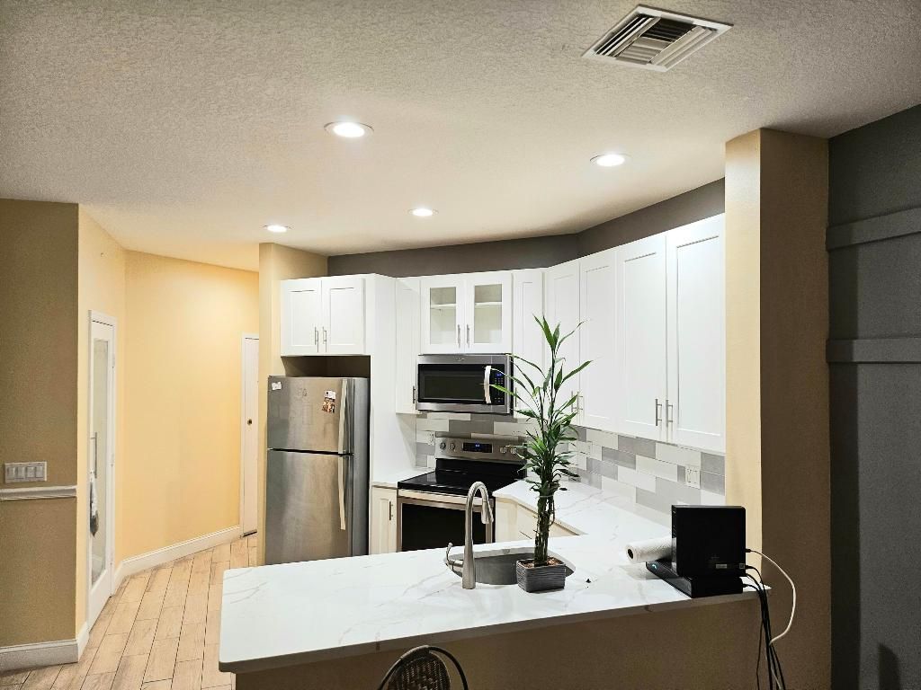 Photo of 8335 Mulligan Circle #A, Port Saint Lucie, FL 34986 (MLS # R10942819)