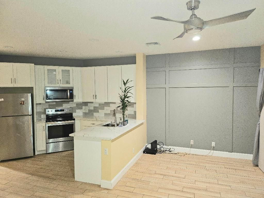 Photo of 8335 Mulligan Circle #A, Port Saint Lucie, FL 34986 (MLS # R10942819)