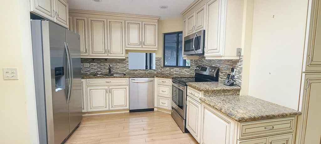 Photo of 5113 Pine Drive, Boynton Beach, FL 33437 (MLS # R11062783)
