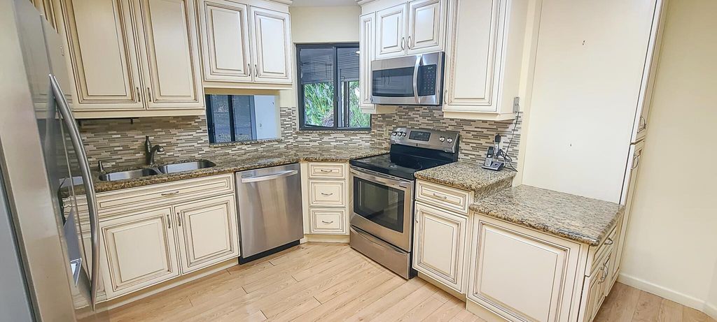 Photo of 5113 Pine Drive, Boynton Beach, FL 33437 (MLS # R11062783)