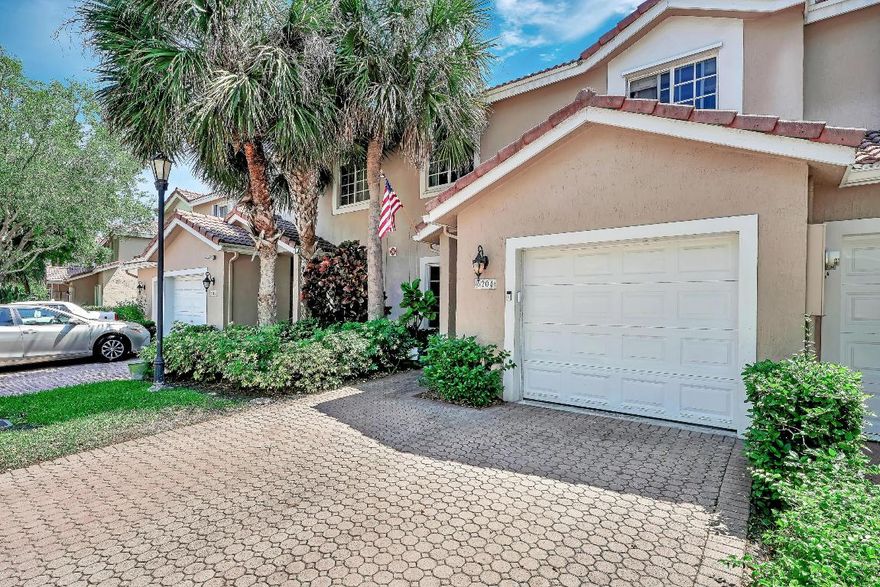 Completely renovated and move-in ready, this spacious 3 bedroom, 2.5 bathroom townhome features a desirable layout with a primary bedroom on the first floor, vaulted ceilings, an enclosed loft, and an additional den suitable for office or flex use. Recent upgrades include a new AC (2024), new range, dishwasher, and microwave, along with updated kitchen, bathrooms, and flooring. Impact windows provide safety and efficiency. Enjoy peaceful water views from the covered patio. Community pool on site. Located in a sought-after Parkland neighborhood close to top-rated schools, shopping, dining, major roads, and houses of worship.