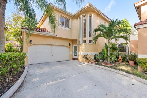 Photo of 11377 Lakeview Drive, Coral Springs, FL 33071 (MLS # B26019145)