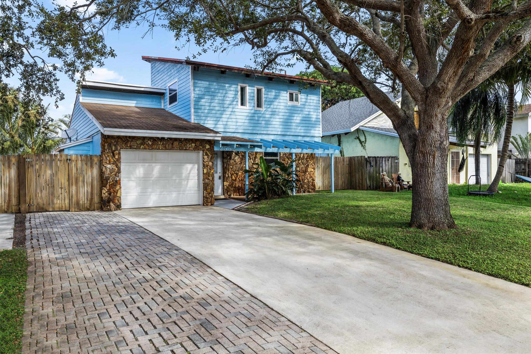 Ideally located only 1.5 miles from the ocean & 2 miles from Atlantic Avenue, this beautifully renovated home has it all! As you enter the home you are greeted with soaring ceilings, an open floor plan, new wood-look tile floors & a impeccably renovated kitchen. The primary suite is enormous! It spans the entire second floor and features a freshly renovated ensuite bathroom & walk-in closet. Downstairs is a guest bathroom with full guest bathroom. Sliding glass doors provide access to the covered patio & fully fenced in private backyard. With an attached 1 car garage, full size washer & dryer, and no HOA, this property is truly one of a kind. Call today for a private tour. This opportunity will not last long!