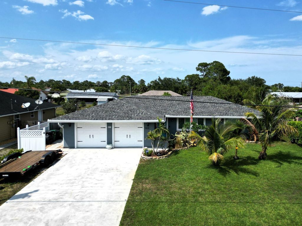 Photo of 1425 SW Algardi Lane, Port Saint Lucie, FL 34953 (MLS # R10994135)