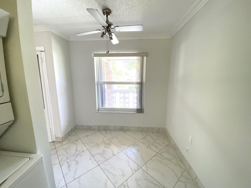 Photo of 2480 Juniper Drive #204, Delray Beach, FL 33445 (MLS # R11127383)