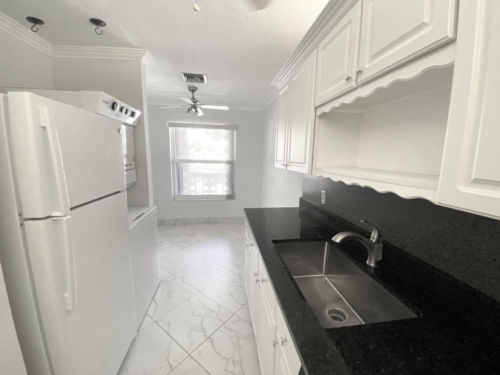 Photo of 2480 Juniper Drive #204, Delray Beach, FL 33445 (MLS # R11127383)