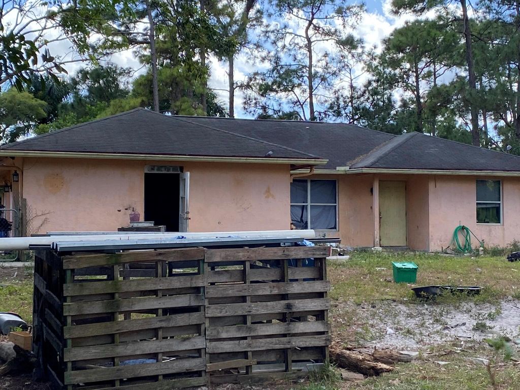 Photo of 17286 42nd Road N, The Acreage, FL 33470 (MLS # R10934086)