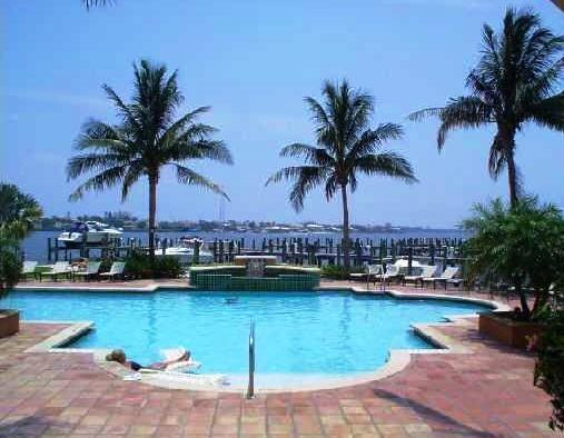 2 Story, 2 bed/2.5 bath townhouse in awesome gated Intracoastal Community of the Yacht Club. Granite counter tops, white cabinets, washer and dryer in unit. Bring your dogs, (2 maximum and no dangerous breeds. Great Location! Beautiful Pool & Spa overlooking the Intracoastal Waterways, tennis courts, fitness center, club house and much more. Less than 3 miles to the beach and only 15-20 minutes to the Palm Beach Airport, West Palm Beach or Delray Beach. Enjoy 4 execellent waterfront restaurants within 5 miles from the townhouse. 15-20 minutes to Delray Beach or West Palm Beach. Can be lease for 3 month or more at $2500 off season. Available until Dec 27th, 2025.