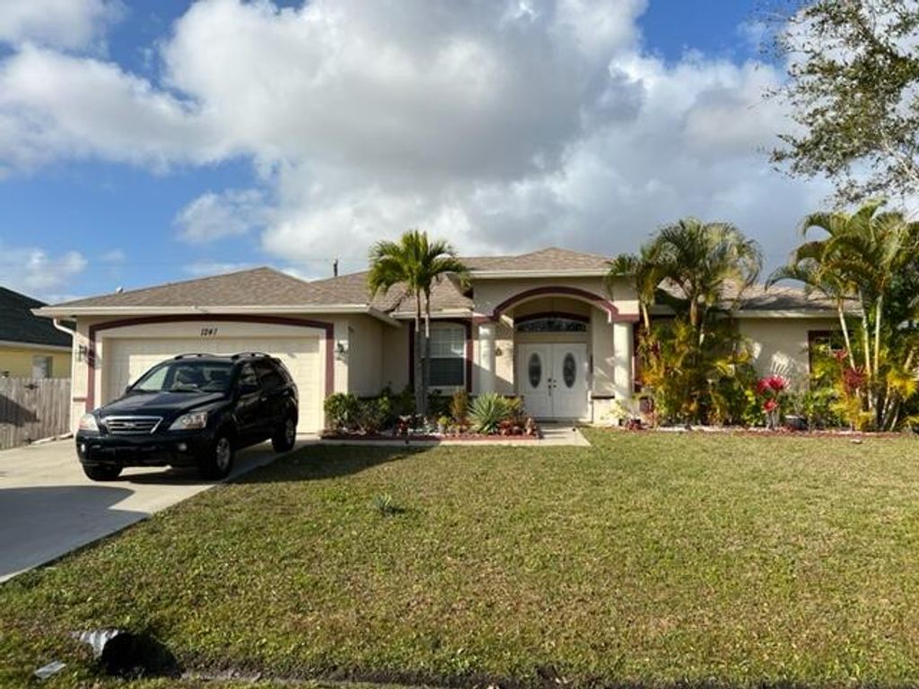 Photo of 1241 SW San Esteban Avenue, Port Saint Lucie, FL 34953 (MLS # R10779544)