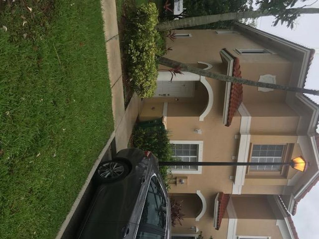 Photo of 5928 Riverside Avenue, Tamarac, FL 33321 (MLS # R10641053)