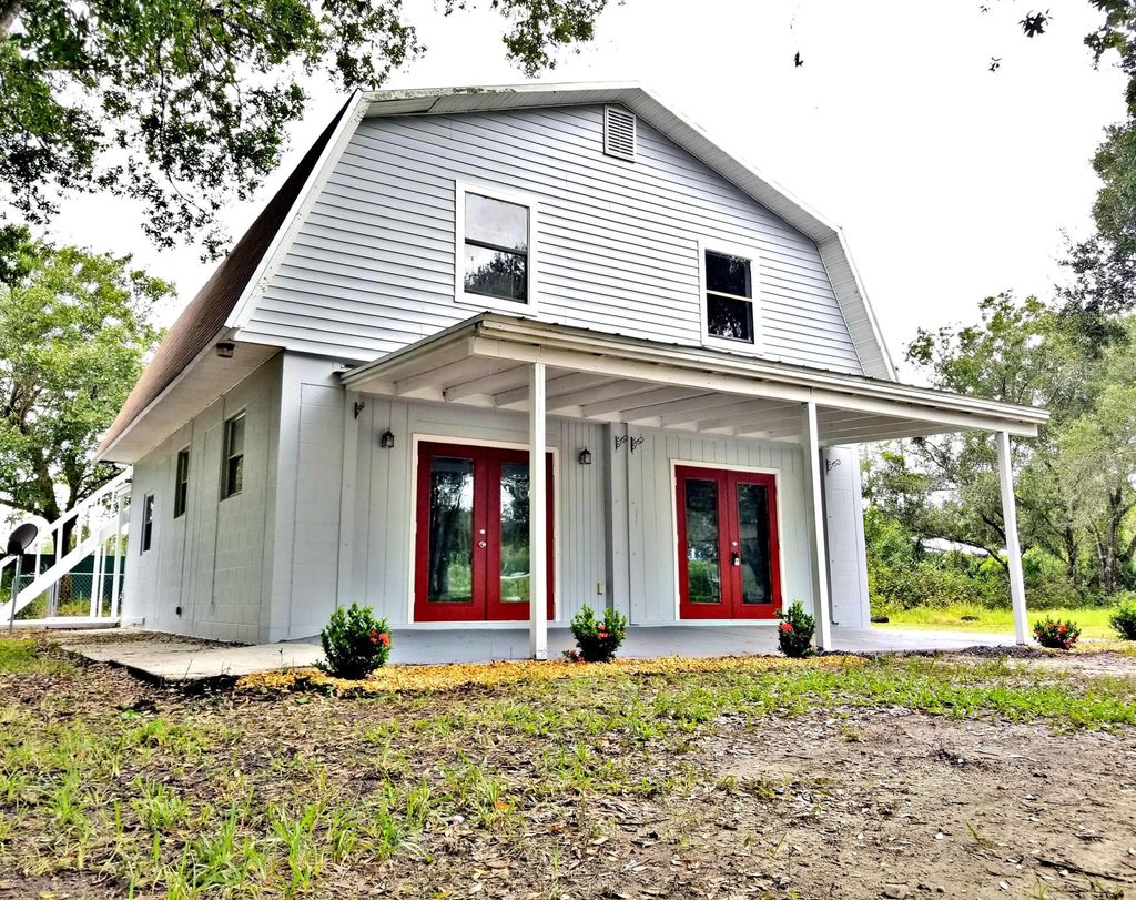 Photo of 3876 Devine Road, Fort Pierce, FL 34981 (MLS # R10999042)