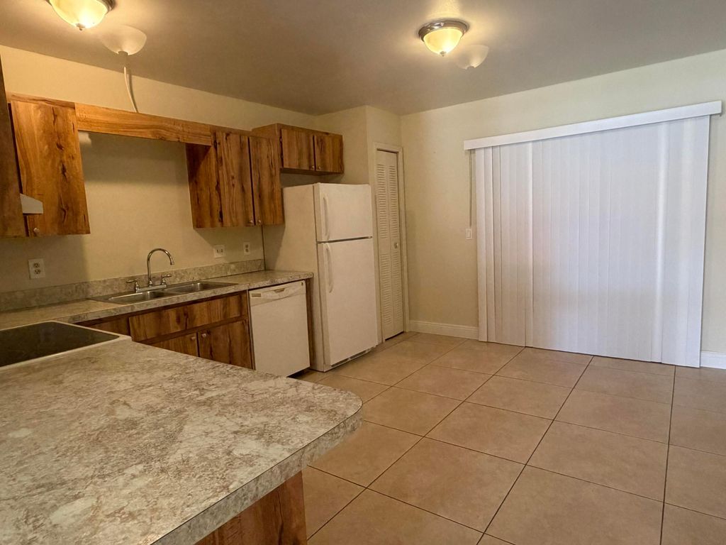 Photo of 5981 Forest Hill Boulevard #2, West Palm Beach, FL 33415 (MLS # B26002060)