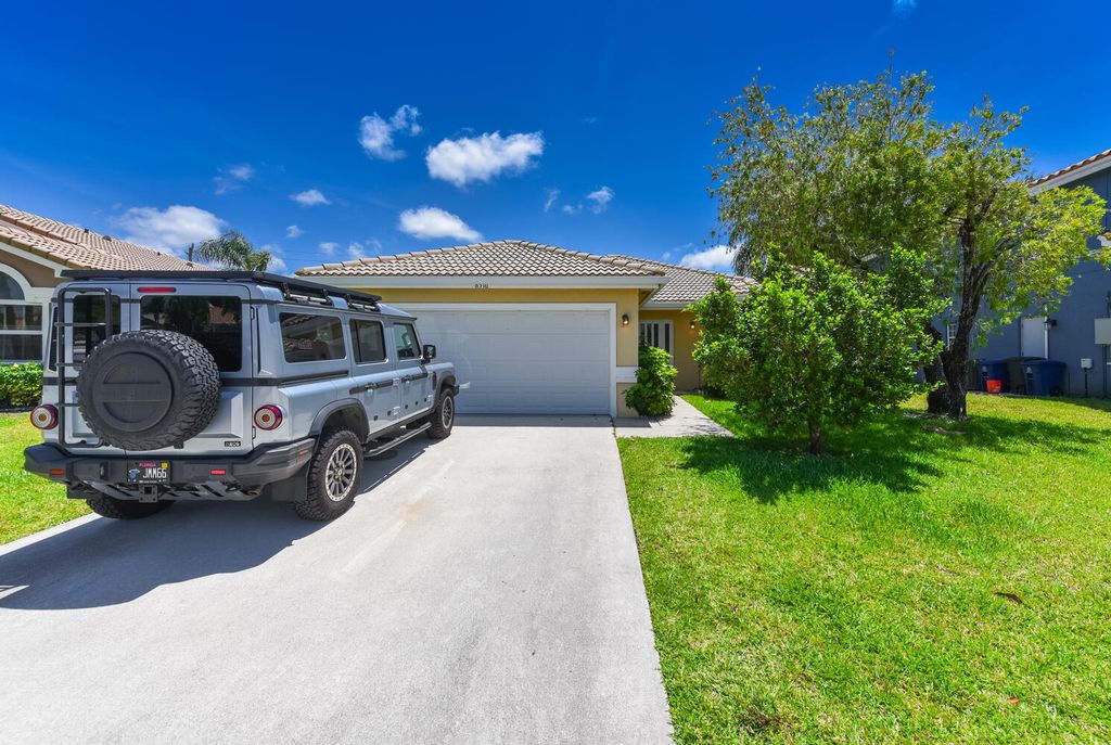 Photo of 8516 Tourmaline Boulevard, Boynton Beach, FL 33472 (MLS # R11089676)