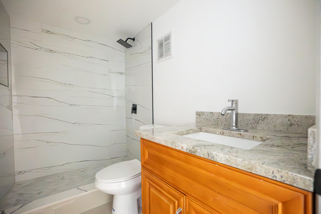 Photo of 3121 NW 47th Terrace, Lauderdale Lakes, FL 33319 (MLS # B26082113)