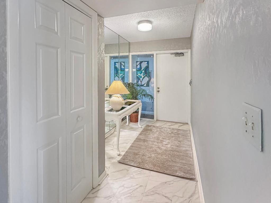 Photo of 3300 Twin Lakes Terrace #103, Fort Pierce, FL 34951 (MLS # R11156716)