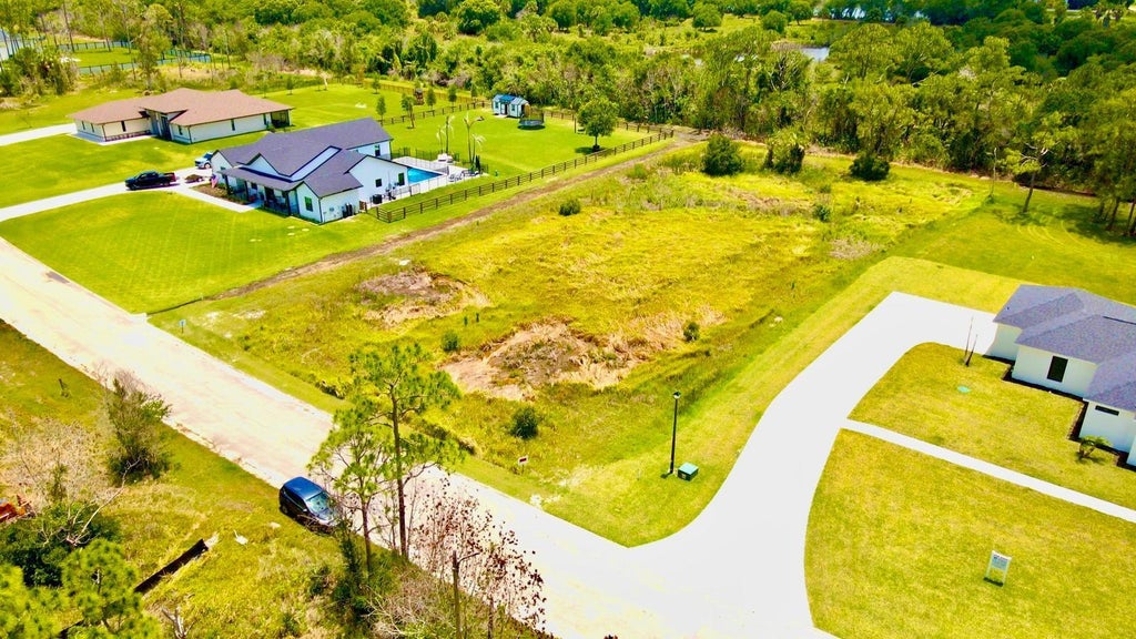 Photo of 10627 Lighter Wood Lane, Fort Pierce, FL 34945 (MLS # B26034080)