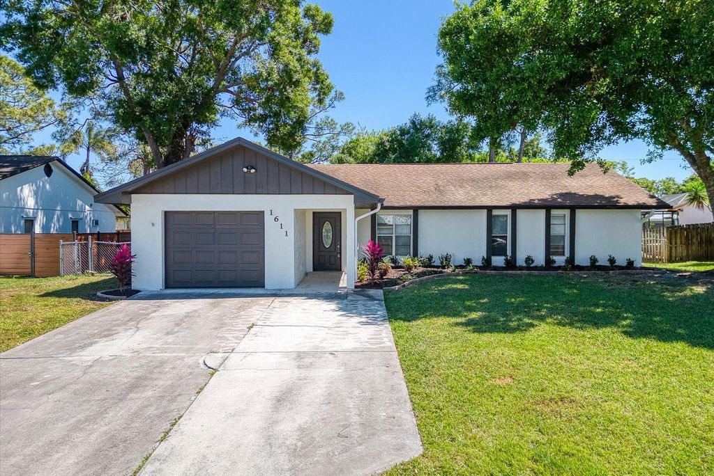 Photo of 1611 SE Mistletoe St, Port St Lucie, FL 34983 (MLS # F10479655)