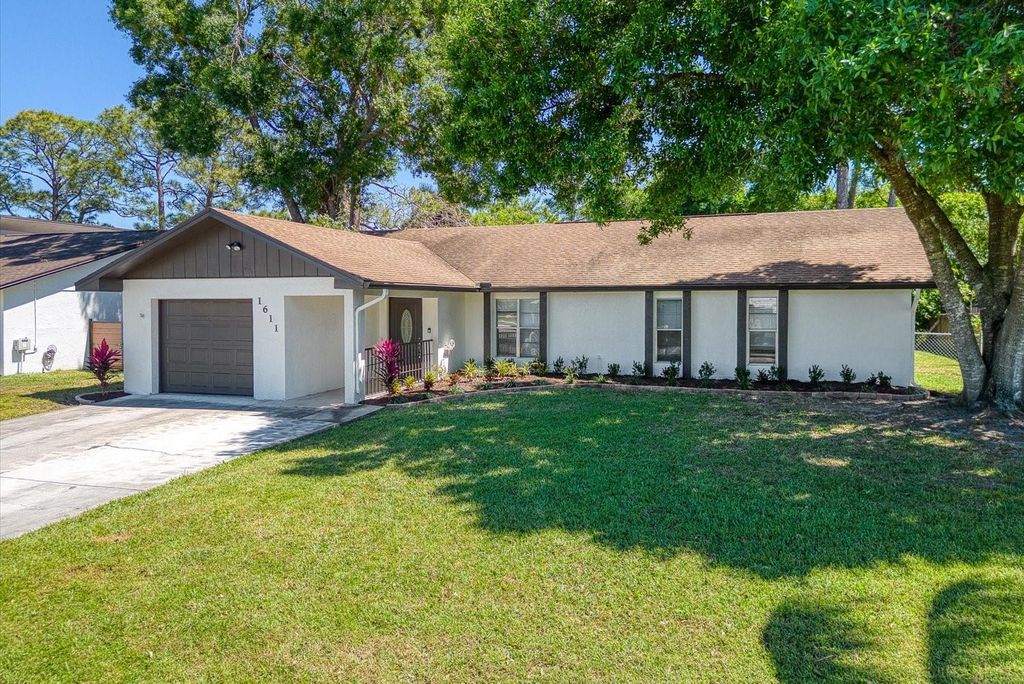 Photo of 1611 SE Mistletoe Street, Port Saint Lucie, FL 34983 (MLS # F10479655)