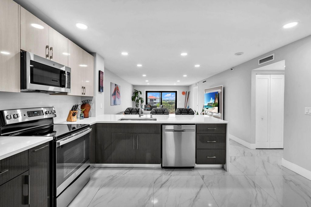 Photo of 2221 Cypress Island Dr #708, Pompano Beach, FL 33069 (MLS # F10540570)