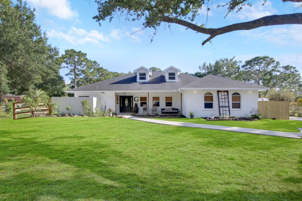 Photo of 10613 Pine Cone Lane, Fort Pierce, FL 34945 (MLS # R10791735)