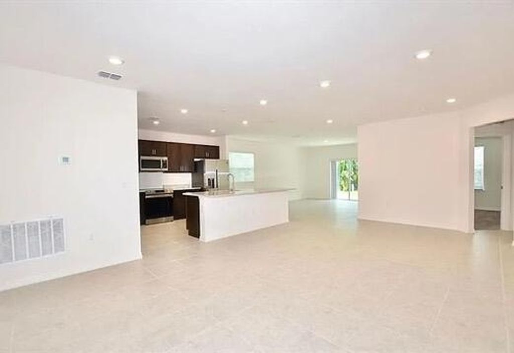 Photo of 1157 SW Irving Street, Port Saint Lucie, FL 34983 (MLS # R11154627)