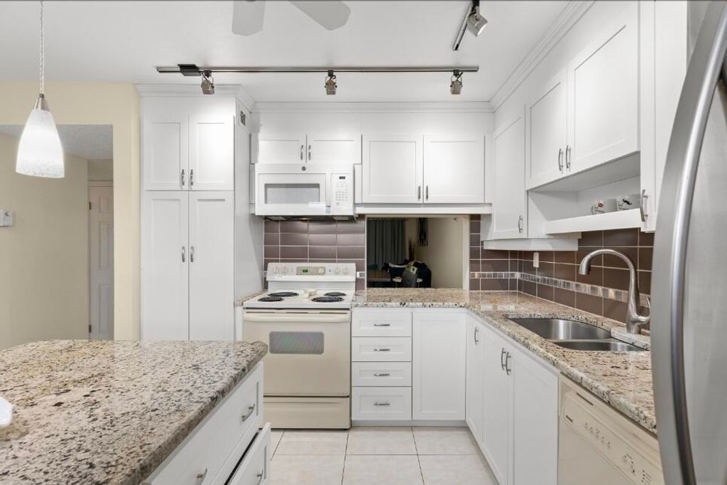 Photo of 6095 N Sabal Palm Boulevard, Tamarac, FL 33319 (MLS # B26016179)