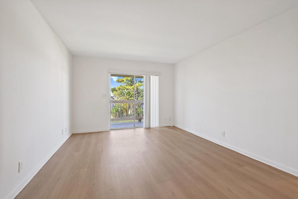 Photo of 1790 Abbey Road #203, West Palm Beach, FL 33415 (MLS # B26018081)