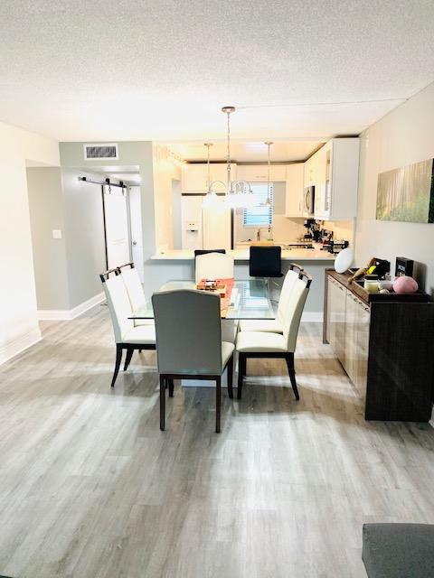 THE BEST 2/2 APARTMENT IN THE ENTIRE BUILDING!! UNIT HAS BEEN REMODELED THROUGHOUT WITH OWNER PUTTING A LOT OF CARING IN EVERY SINGLE ROOM. IT IS READY TO MOVE IN. BUILDING OFFERS NICE AMENITIES SUCH AS TENNIS COURTS, GOLF COURSE, SWIMMING POOL, EXTRA STORAGE, CABLE, WIFI, WATER, SEWER, LOBBY, AND COMMON AREAS WITH A LOW HOA!! GREAT LOCATION NEAR TO ALL SHOPPINGS AND RESTAURANTS. EXCELLENT SCHOOL DISTRICT FOR YOUR KIDS! A MUST SEE! RENTAL RESTRICTIONS APPLY!