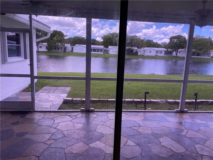 Gorgeous waterviews from bedrooms, dining area and kitchen.  Huge screened patio, with pass through from kitchen.  Updated Kitchen and bathrooms, recently painted. Two master suites, familyroom/ Den area in addition to formal living and dining.  Extreme bright, and airy, split design for maximum enjoyment. Washer & dryer in the garage, ample shelves and spare refrigerator in garage.  Additional parking in driveway. Active Community in the Heart of Plantation. Offers excellent amenities, new roofs, lawn care, pest control and exterior paint. Club house, theater, community pool and much more. Over 55 community  Association Restrictions - no under 18, min 720 Credit Score and 20% down.  No lease 1st year. No Pets only support & service animals.