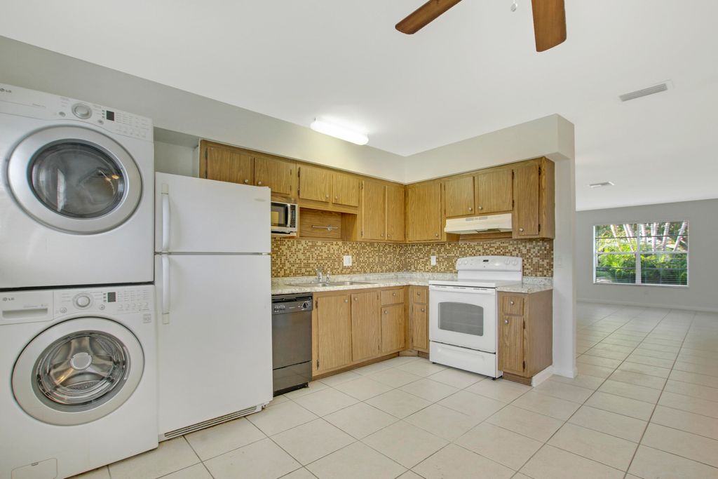 Photo of 1919 Doffer Lane #1933, Juno Beach, FL 33408 (MLS # B26007863)