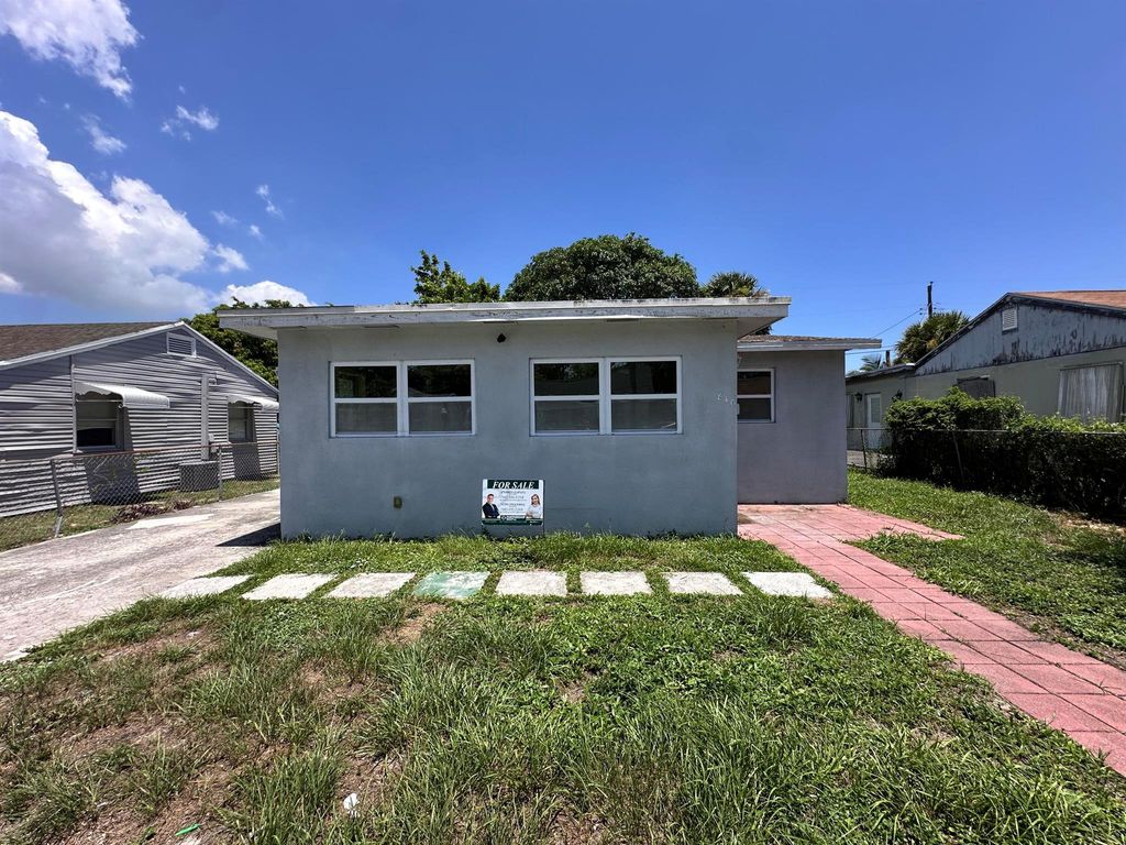 Photo of 840 W 1st Street, Riviera Beach, FL 33404 (MLS # R11142681)