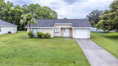 Photo of 462 SW Peach Street, Port St Lucie, FL 34983 (MLS # R11127113) Photo of 462 SW Peach Street, Port St Lucie, FL 34983 (MLS # R11127113)