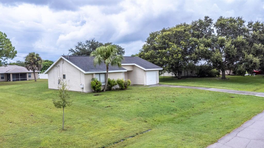 Photo of 462 SW Peach Street, Port Saint Lucie, FL 34983 (MLS # R11127113)