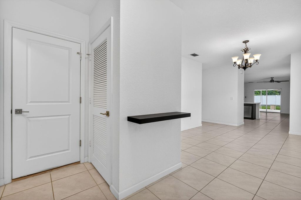Photo of 6814 Mitchell Street, Jupiter, FL 33458 (MLS # B26018404)